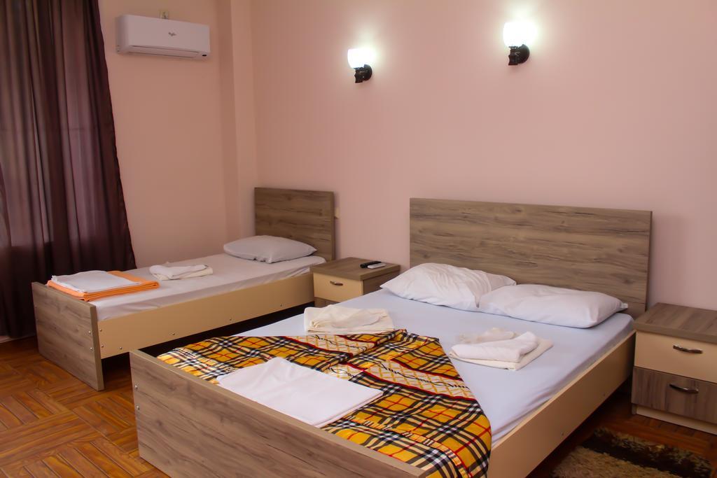 Hulus Hotel Махінджаурі Номер фото